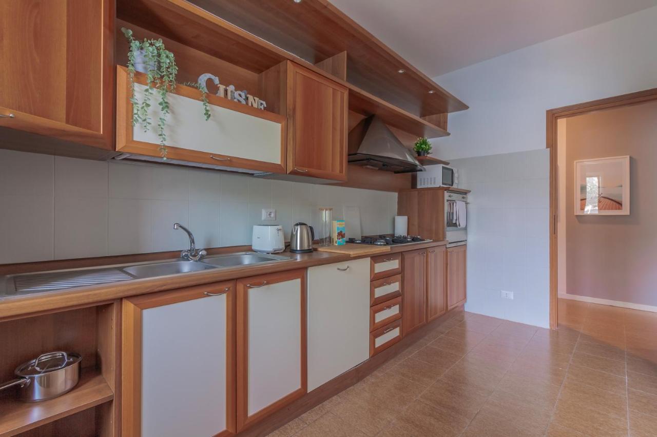 Ninfea Apartments By Wonderful Italy Лецено Екстериор снимка
